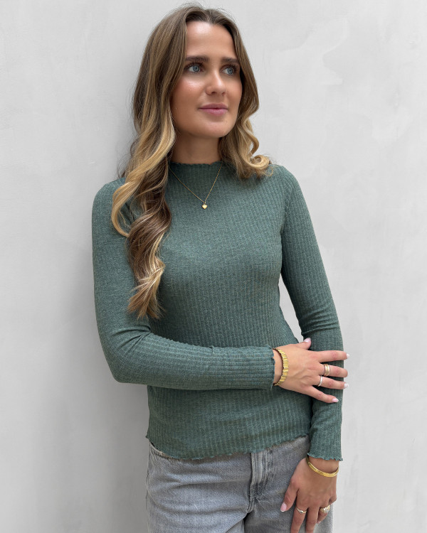 Rib bluse med bølgekant til damer