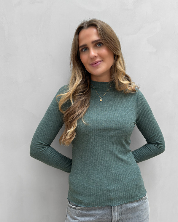 Rib bluse med bølgekant til damer