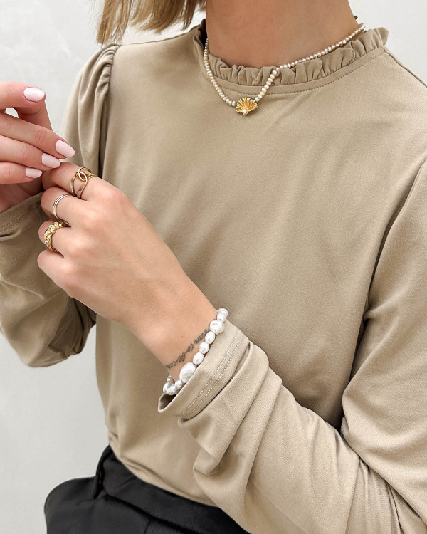 Bløde bluser med detaljer