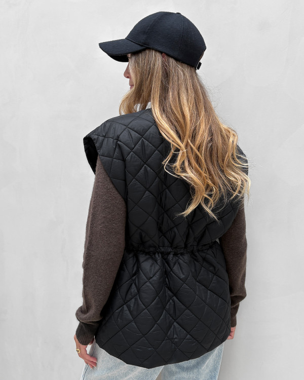 Quiltet sort overgangsvest