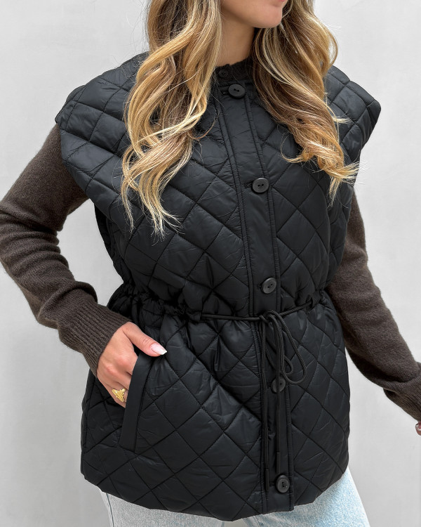 Quiltet sort overgangsvest