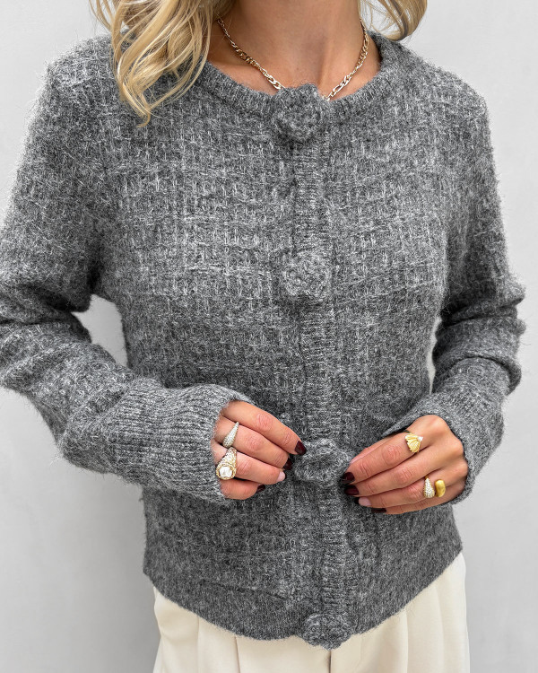 Cardigan med fine roseknapper og lommer