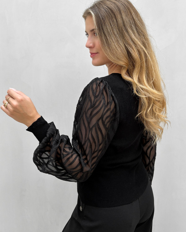 Elegant sort bluse med festlige ærmer