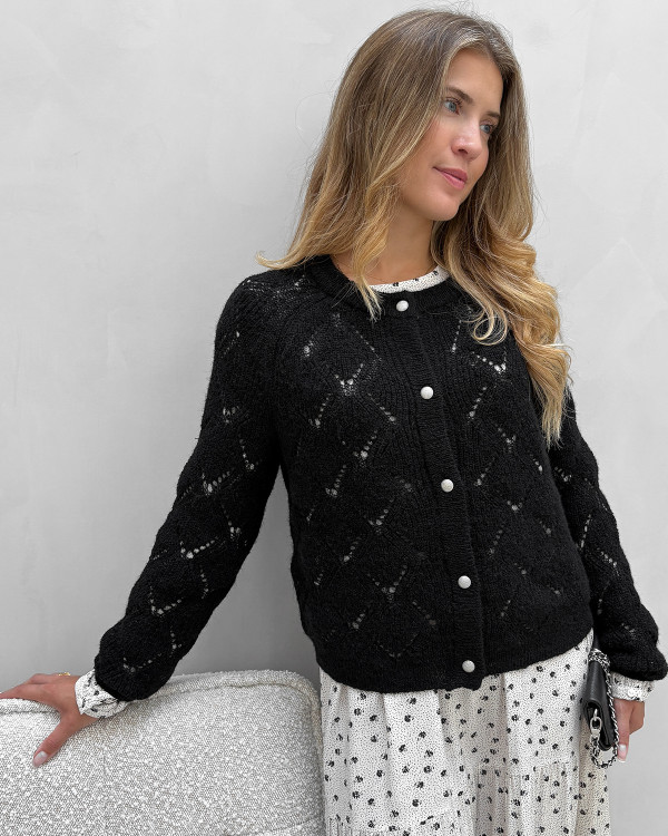 Sort cardigan med flotte knapper