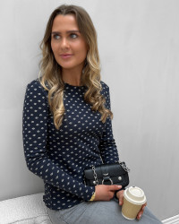 Hulmønster bluse med print